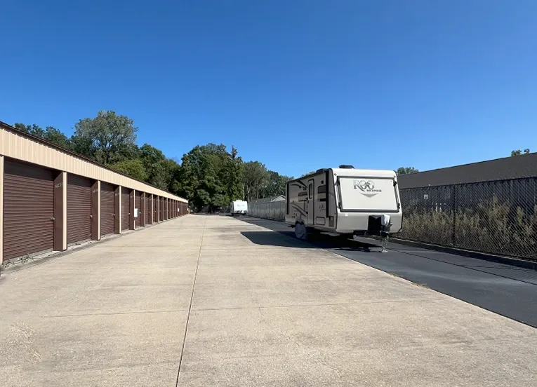 Exterior of storage units and RV parking at Lambertville Mini Storage Lewis facility.