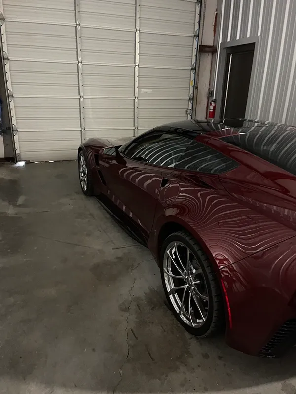 Sportscar parked in a storage unit at Volunteer Storage Lenoir City facility.