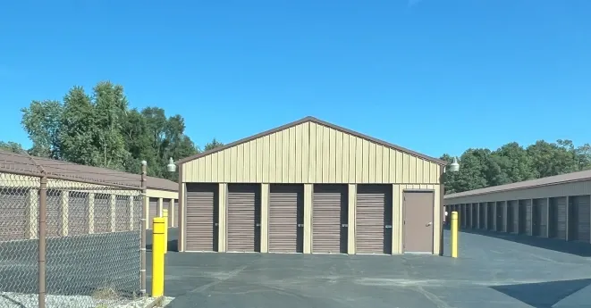 Rows of drive-up storage units with paved lanes at Lambertville Mini Storage Secor.
