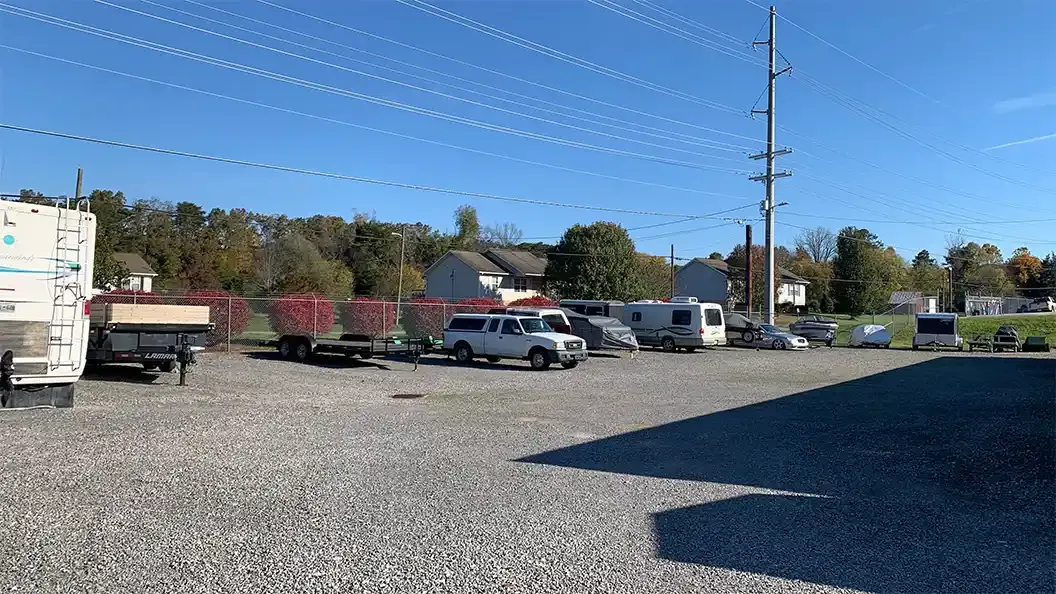 Volunteer Storage Seymour outdoor uncovered parking with trailers, boats, and an RV camper