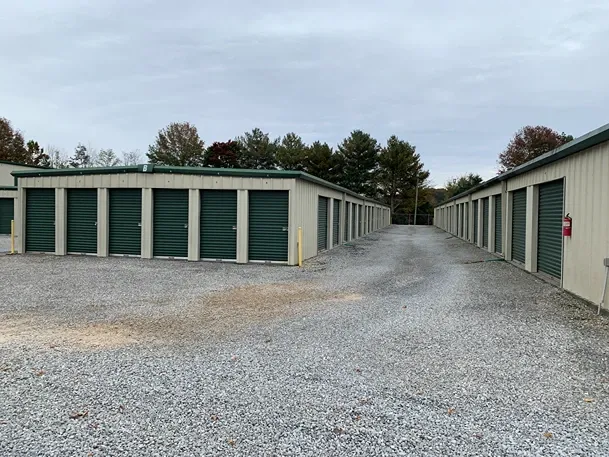 Rows of storage units at Volunteer Storage Tellico Village with gravel paths.