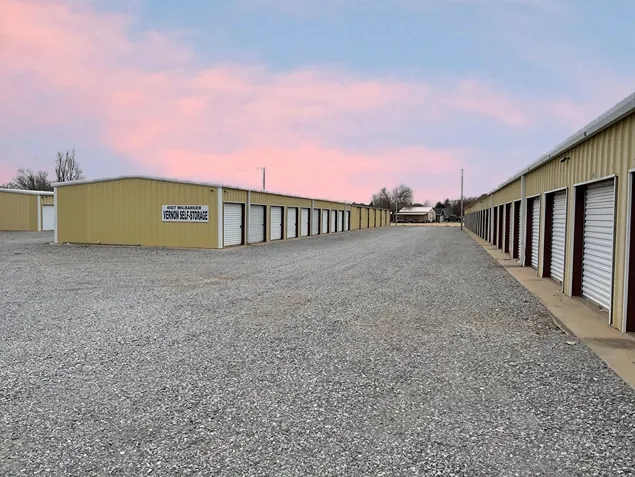 Entrance area with keypad gate and fencing at Vernon Self Storage.