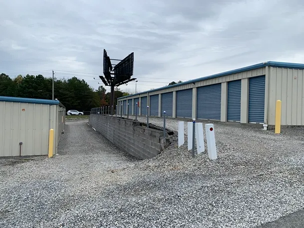 Storage unit row and gravel paths at Volunteer Storage Vonore.