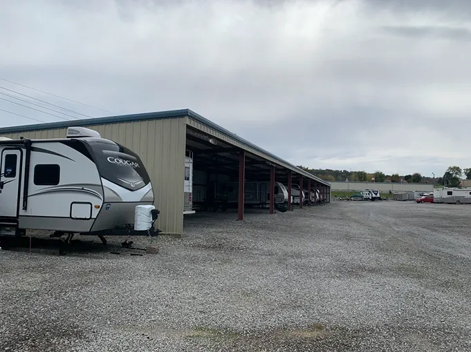 Facility exterior with covered vehicle parking and open unit access at Volunteer Storage Vonore.